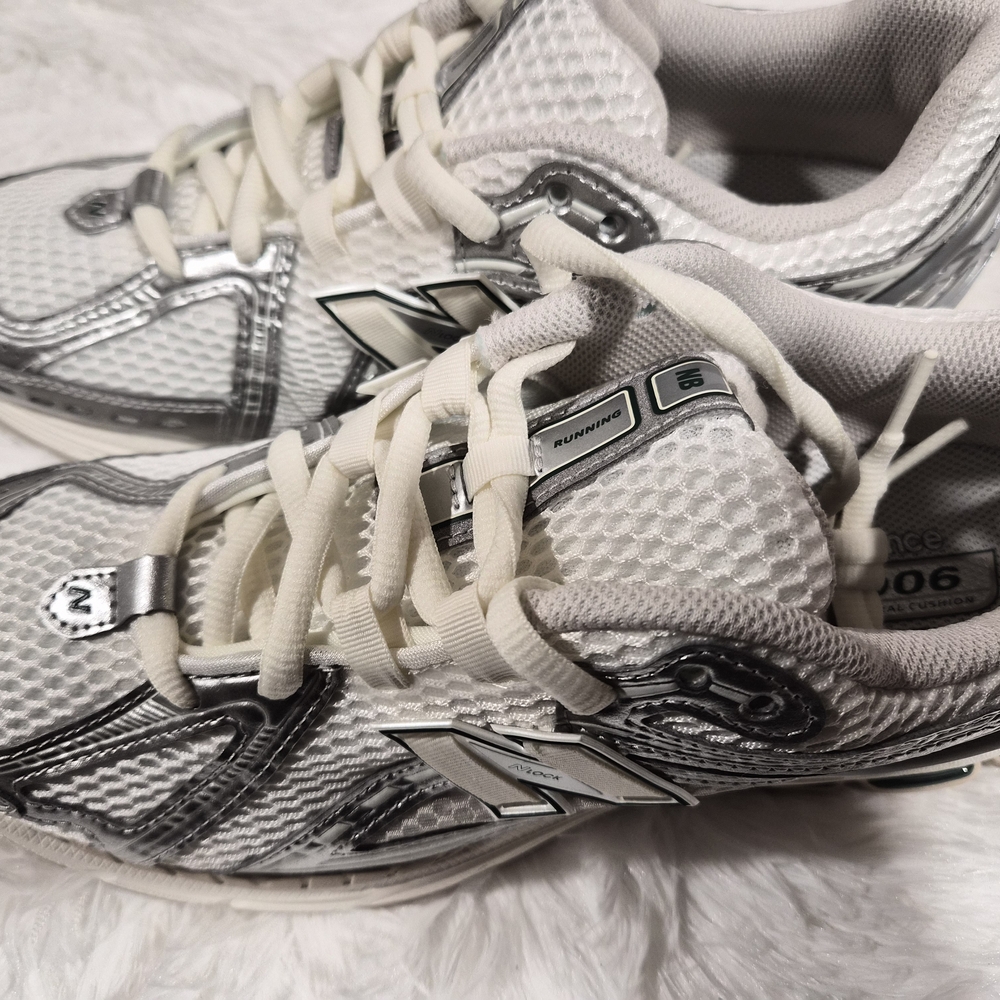 New Balance Women's Metallic Silver and White Sneakers